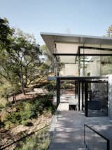 This See-Through California Home Magically Hangs Above a Creek Bed - Photo 9 of 34 - 