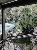 This See-Through California Home Magically Hangs Above a Creek Bed - Photo 12 of 34 - 