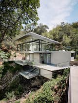 This See-Through California Home Magically Hangs Above a Creek Bed - Photo 3 of 34 - 