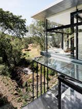 This See-Through California Home Magically Hangs Above a Creek Bed - Photo 11 of 34 - 