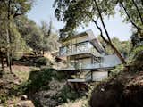 This See-Through California Home Magically Hangs Above a Creek Bed - Photo 2 of 34 - 