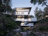 This See-Through California Home Magically Hangs Above a Creek Bed - Photo 1 of 34 - 