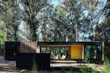 A Prefab Cabin Camouflaged in a South American Forest Glows From Within - Photo 6 of 15 - 