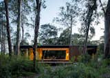 A Prefab Cabin Camouflaged in a South American Forest Glows From Within - Photo 2 of 15 - 
