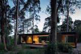 A Prefab Cabin Camouflaged in a South American Forest Glows From Within - Photo 7 of 15 - 