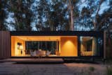 A Prefab Cabin Camouflaged in a South American Forest Glows From Within - Photo 4 of 15 - 