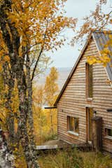 A Central Fireplace Anchors This Uber-Cozy Cabin in a Swedish Forest - Photo 7 of 25 - 