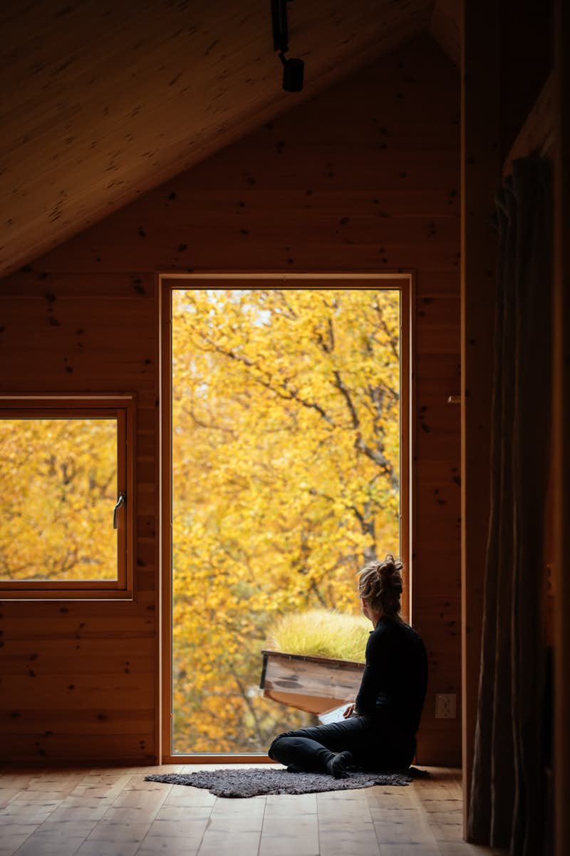 photo-22-of-25-in-a-central-fireplace-anchors-this-uber-cozy-cabin-in-a