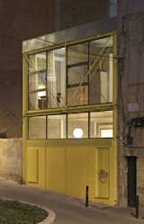 A Bright Yellow Steel Home in Barcelona Breaks With Its Brick Neighbors - Photo 5 of 14 -