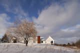 A Snow-White Home in Rural Ontario Freshens Up the Farmhouse Look - Photo 2 of 16 - 