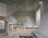 This Board-Formed Concrete “Cabin” Has the Longest Stovepipe We’ve Ever Seen - Photo 16 of 22 - 
