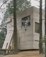 This Board-Formed Concrete “Cabin” Has the Longest Stovepipe We’ve Ever Seen - Photo 5 of 22 - 