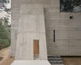 This Board-Formed Concrete “Cabin” Has the Longest Stovepipe We’ve Ever Seen - Photo 9 of 22 - 