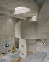 This Board-Formed Concrete “Cabin” Has the Longest Stovepipe We’ve Ever Seen - Photo 13 of 22 - 