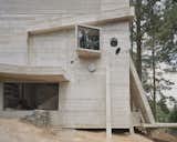 This Board-Formed Concrete “Cabin” Has the Longest Stovepipe We’ve Ever Seen - Photo 6 of 22 - 