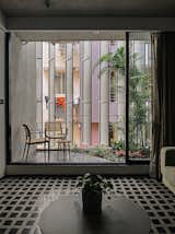Perforated Panels Let Light and Air Flow Through a 12-Foot-Wide Home in India - Photo 7 of 15 - 