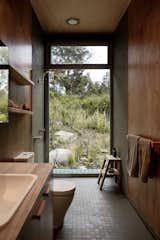 A Corrugated Steel Shell Gives Way to Warm Timber Interiors at This Cabin Retreat in Tasmania - Photo 26 of 27 - 