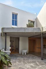 You’ll Never Guess the House Attached to This Concrete Extension - Photo 13 of 21 - 