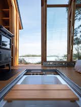 This $480K Prefab Cabin Slides Apart to Reveal a Glass Enclosed Room - Photo 16 of 21 - 