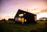 Lots of Windows and a Sunroom Suffuse This Black Chilean Cabin With Light - Photo 4 of 21 - 