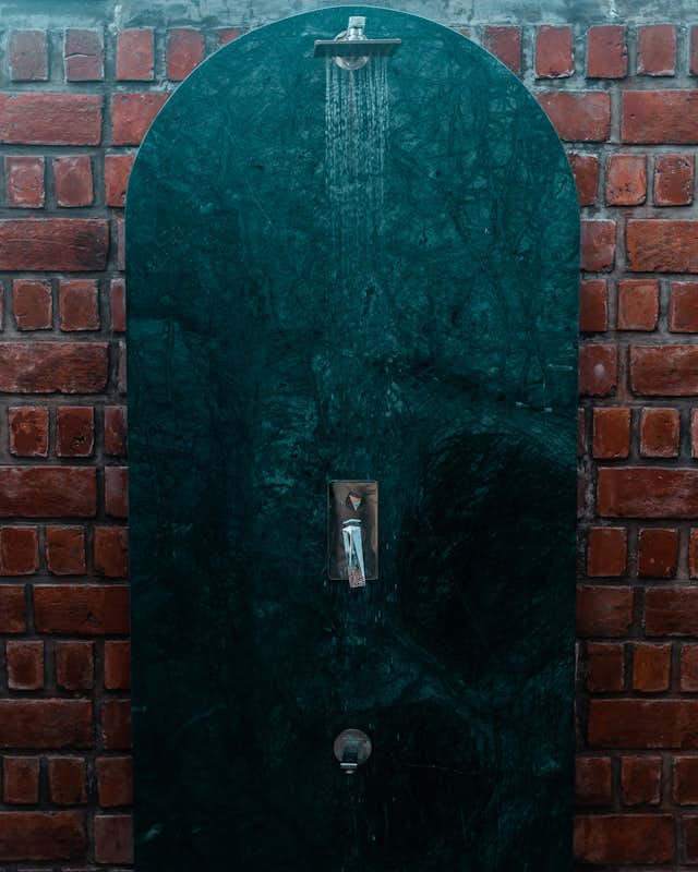 Photo 17 of 17 in Mesmerizing Brick Walls Symbolize Resilience at This