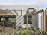 Exposed Rafters Bridge This Australian Home With Its Lushly Landscaped Yard - Photo 2 of 24 - 