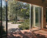 Lush Gardens Conceal This Glass-Wrapped Live/Work Space in Belgium - Photo 9 of 19 - 