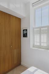 Oak Cabinets, Cupboards, and Banquette Seating Reset a Small East London Flat - Photo 12 of 14 - 