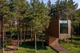 Exterior, Tiny Home, Wood, Flat, Prefab, Metal, Cabin, and Glass  Exterior Flat Wood Prefab Glass Photos from Gravity’s No Match for This Cantilevered Cabin in Estonia