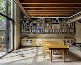 A Wall of Books Puts the Finishing Touch on This Rough-Hewn Backyard Home in Austin - Photo 6 of 17 - 