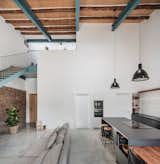 It Was a Workshop and a Warehouse. Now It’s a Family Home With a Soaring Blue Stair - Photo 7 of 18 - 