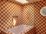 The original home had 2.5 bathrooms, all of which were gutted and redone during the renovation. The shared upstairs bathroom was on the receiving end of the most extensive—and eye-catching—makeover. Checkerboard tiles from Fireclay are applied from floor-to- ceiling to achieve the “funky and different” they were after.