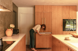 They selected panel-ready appliances from Fisher and Pico for a modern, slick look. Carlos was also adamant on opting for an induction cooktop:  “I'm sorry to all the people who consider themselves home chefs, but I'm a big fan of induction. I cook quesadillas and scrambled eggs. I'm not making beef bourguignon,” says Carlos. "My friends have all these beautiful six-burner Viking stoves and it's like everything falls into the stove. Cleaning it is a nightmare. I'm all about efficiency. So I just finish cooking, spray it down, move on, and it looks great.”