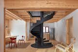 This Ski Cabin’s Spiral Stair Doubles as... a Woodburning Stove?