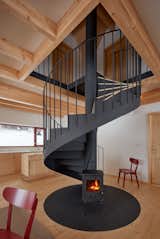 This Ski Cabin’s Spiral Stair Doubles as... a Woodburning Stove? - Photo 9 of 14 - 