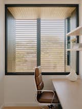 Sunlight filters through silver ash screens in the study, as well as the bedrooms.