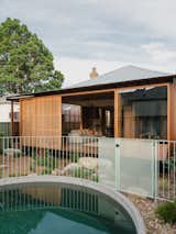 An Australian Home Plays Peek-A-Boo With Spotted Gum Sliding Screens