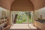 An Arched Timber Vault Promises Privacy Within This Tasmanian Cottage
