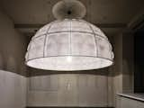 Three 10-foot-wide Custom Lamps Help Transform a 1930s Office Into an Apartment - Photo 12 of 13 - 