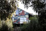 A Colorful Mural Makes a Large Impact on This Tiny Coastal Retreat - Photo 4 of 20 - 