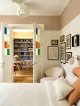 An Unsightly Apartment Gets a New Look With Stained Glass Doors and Colorful Wallpaper