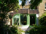 This London Renovation’s Corrugated Cladding Is Sneakily as Green as Its Painted Trim - Photo 1 of 13 - 