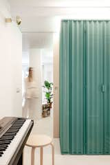 A Perforated Metal Box Hides the Bathroom in This Small Madrid Apartment - Photo 12 of 13 - 