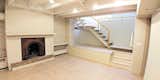 Before: The apartment came with two fireplaces, which were both preserved but striped of their accretive finishes.