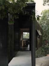 An Airy Black Cabin Tucks Into a Tree Canopy in Australia - Photo 5 of 18 - 