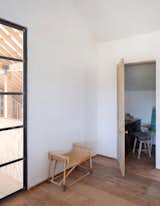 Kelli spent $6,500 on antique cypress doors inside the loft. 
