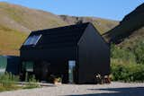 An Icelandic Cabin’s Pitched Roof Mirrors the Mountain Behind It - Photo 5 of 17 - 