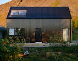 An Icelandic Cabin’s Pitched Roof Mirrors the Mountain Behind It - Photo 6 of 17 - 