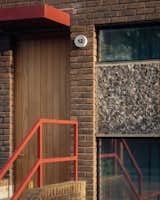 Red Steel and Brick Enliven a ’70s Rowhouse Renovation in London - Photo 2 of 15 - 