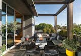 A 48-foot-long deck spans the width of the third level, which contains the kitchen, dining area, and living room.&nbsp;